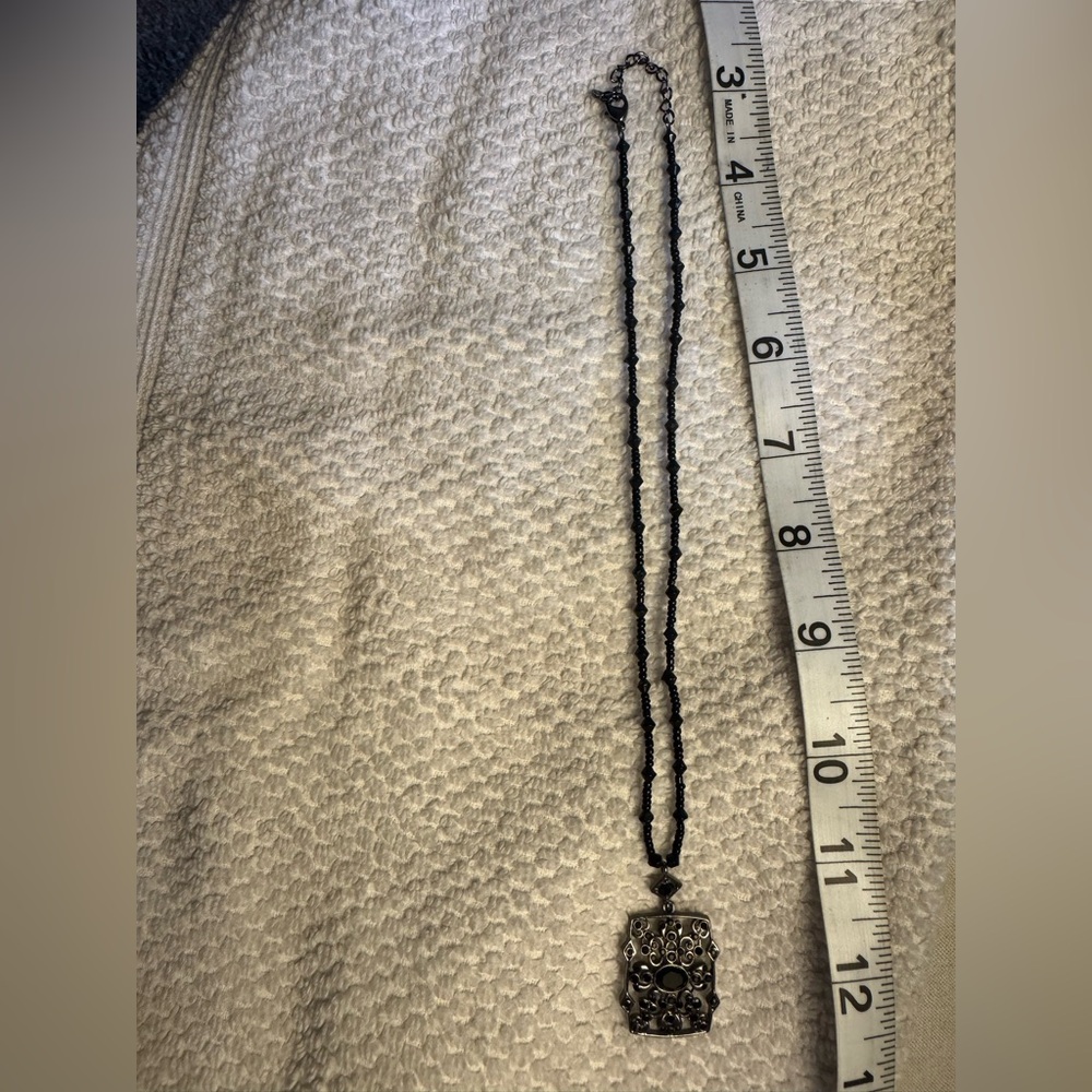Black Beaded Necklace with Silver Pendant